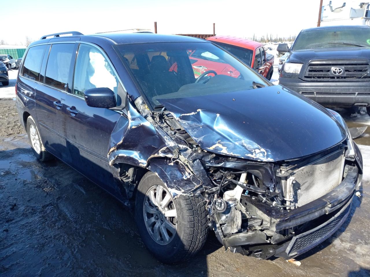 HONDA ODYSSEY EX 2010 with VIN 5FNRL3H4XAB036465 - Photo from auction