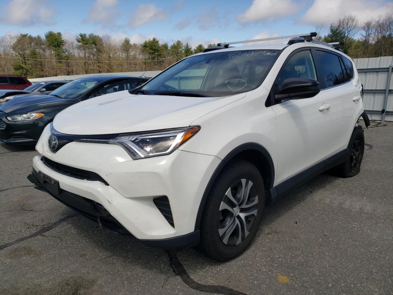 Photo 2 from auction – 2017 TOYOTA RAV4 LE with VIN JTMBFREV4HJ115092