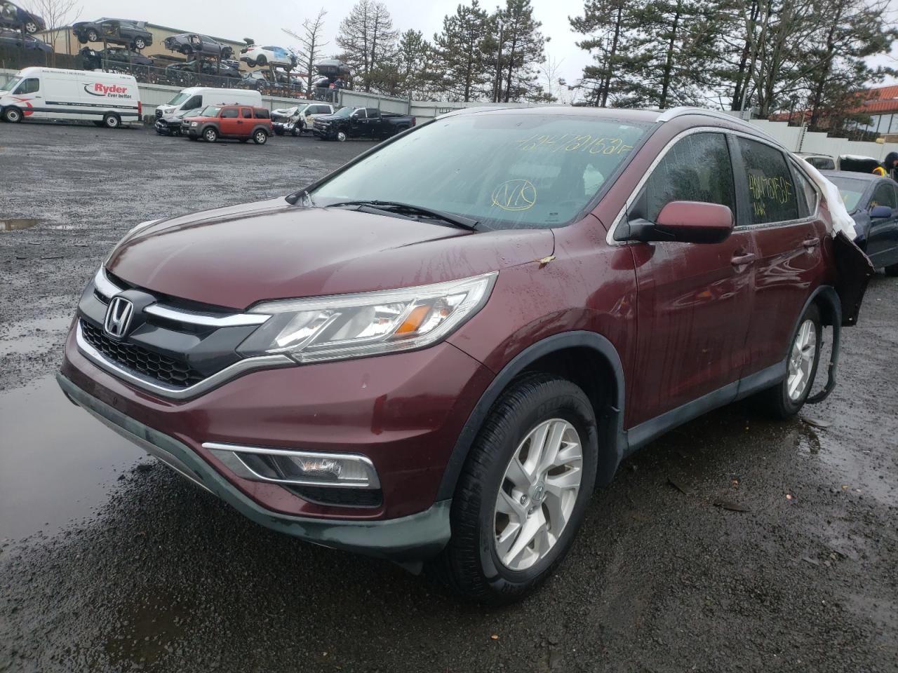 Photo 2 from auction – 2015 HONDA CR-V EXL with VIN 2HKRM3H71FH556778