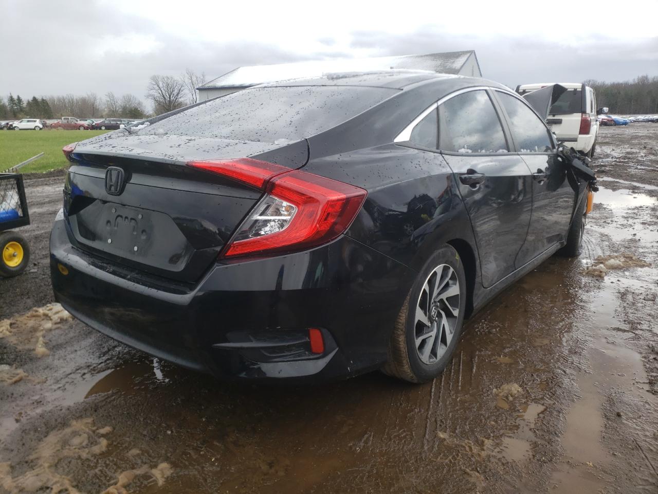 Photo 4 from auction – 2016 HONDA CIVIC EX with VIN 2HGFC2F73GH574021