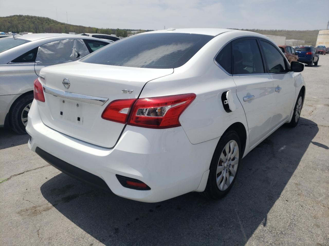 Photo 4 from auction – 2016 NISSAN SENTRA S with VIN 3N1AB7AP3GL636530