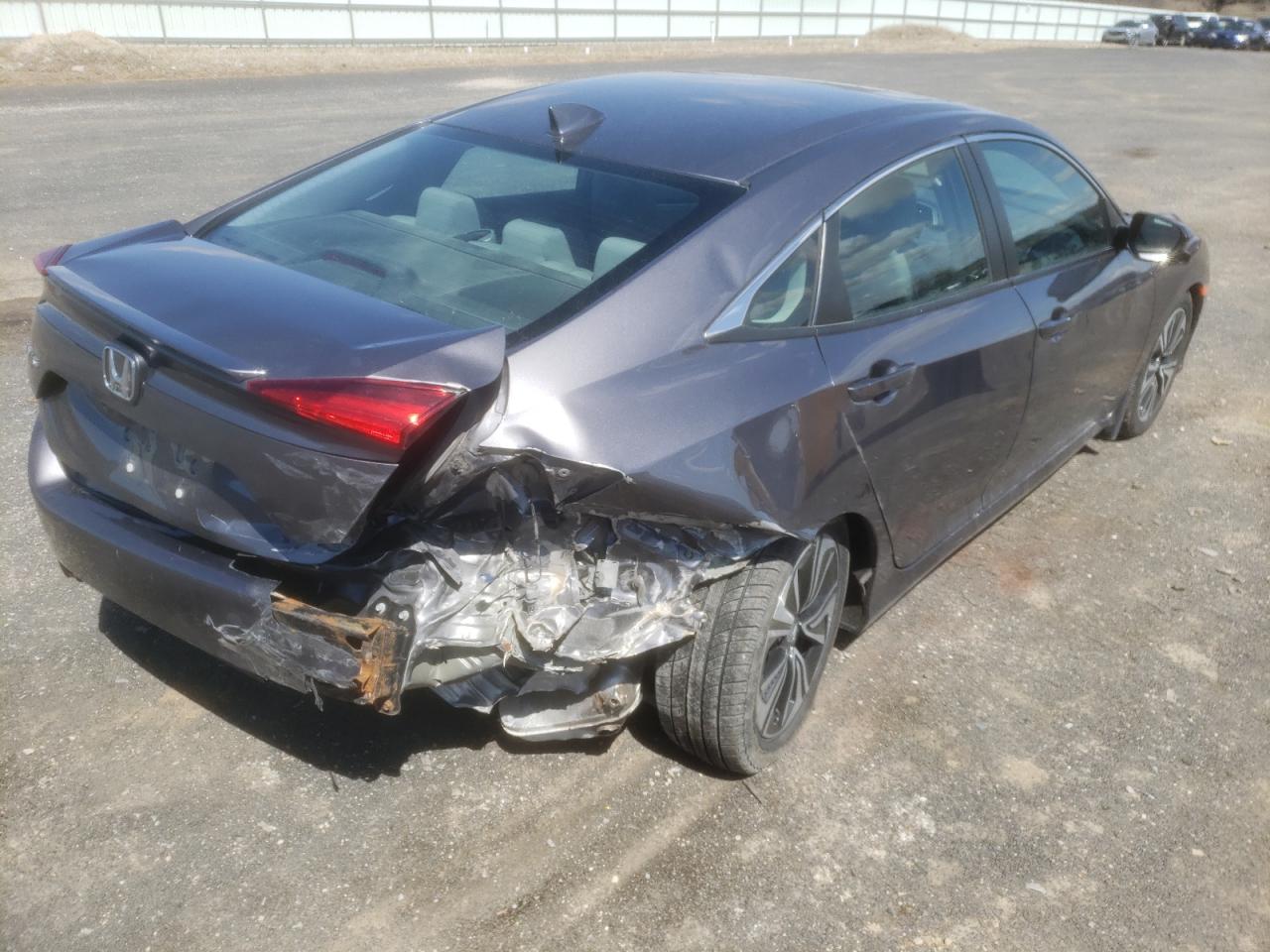 Photo 4 from auction – 2018 HONDA CIVIC EX with VIN 19XFC1E37JE003402
