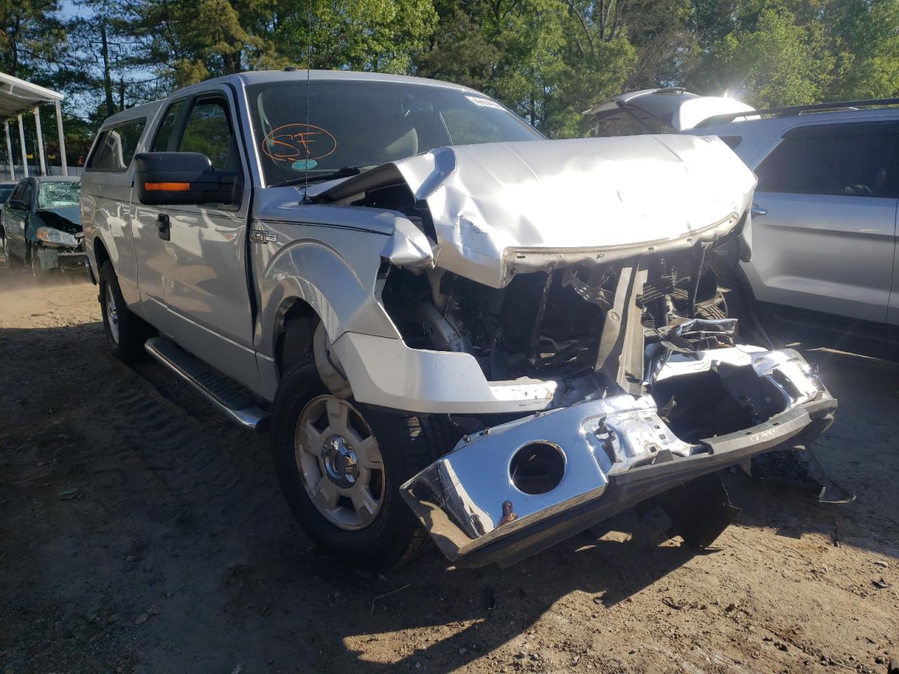 FORD F150 SUPER 2011 with VIN 1FTEX1CM9BFA48411 - Photo from auction