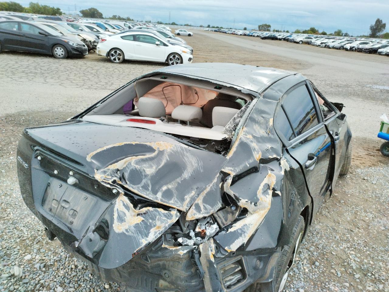 Photo 10 from auction – 2012 HONDA CIVIC LX with VIN 2HGFB2F56CH609940