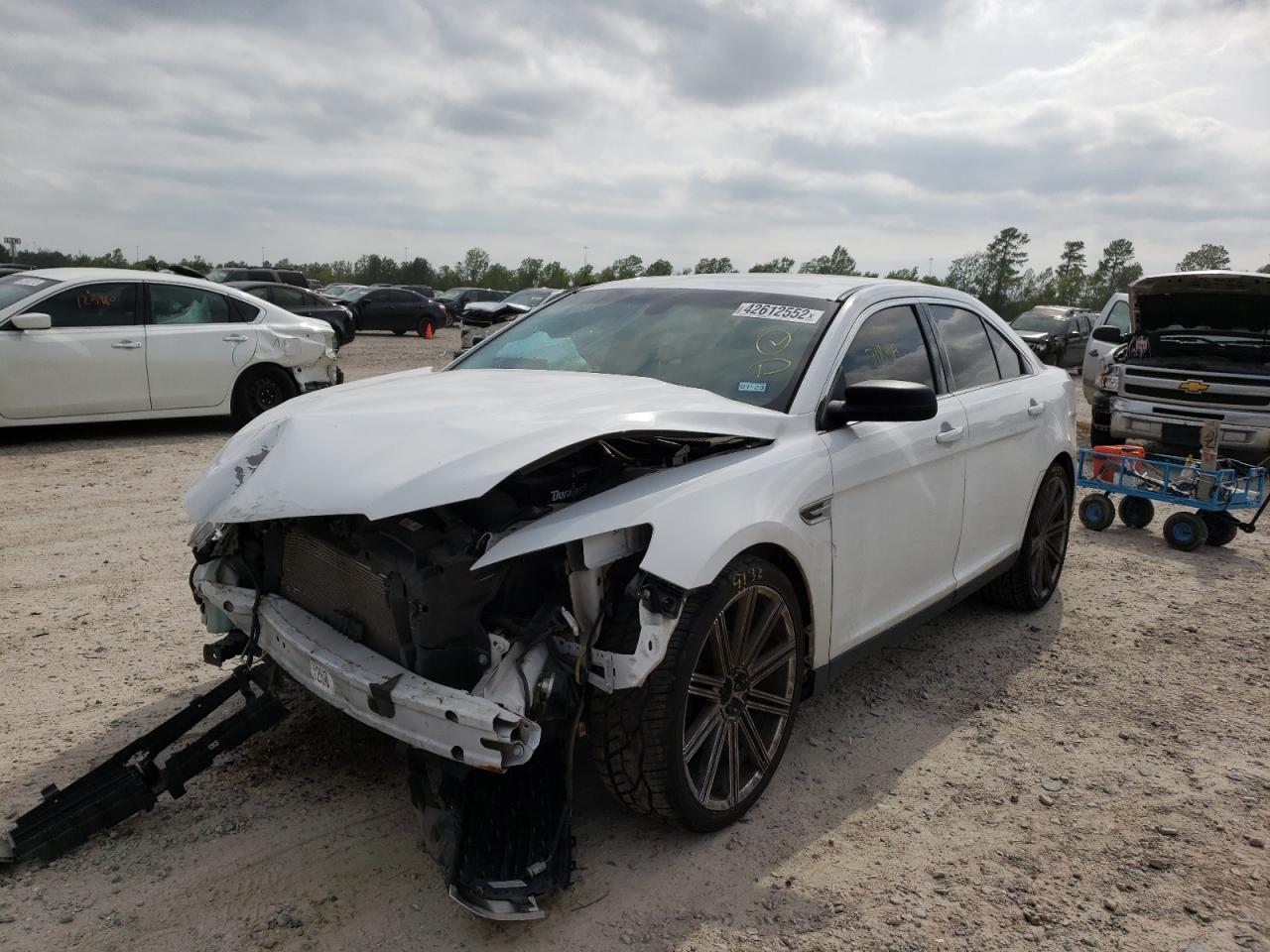 Photo 2 from auction – 2016 FORD TAURUS SE with VIN 1FAHP2D82GG125339