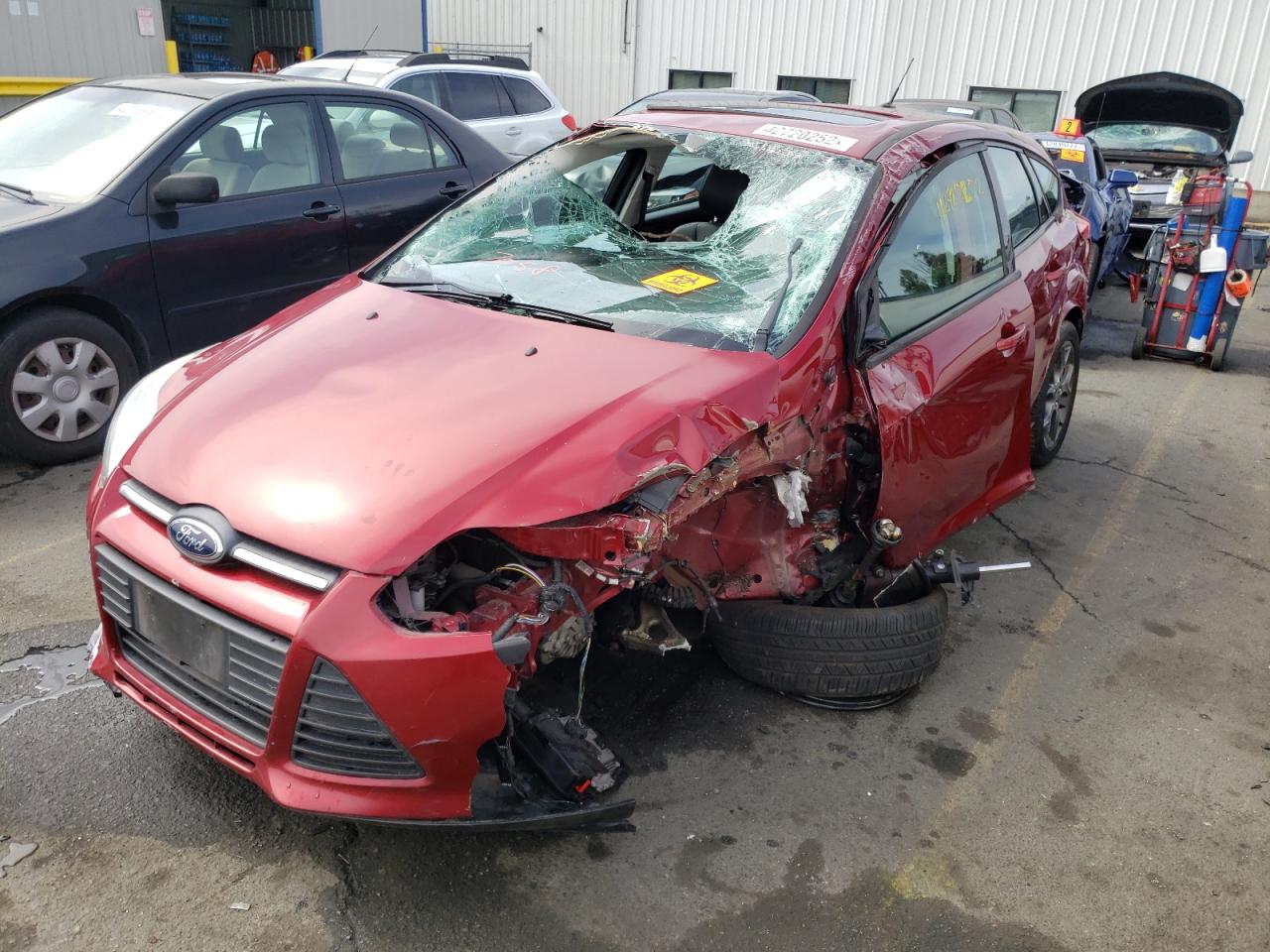 Photo 9 from auction – 2014 FORD FOCUS SE with VIN 1FADP3K21EL157058