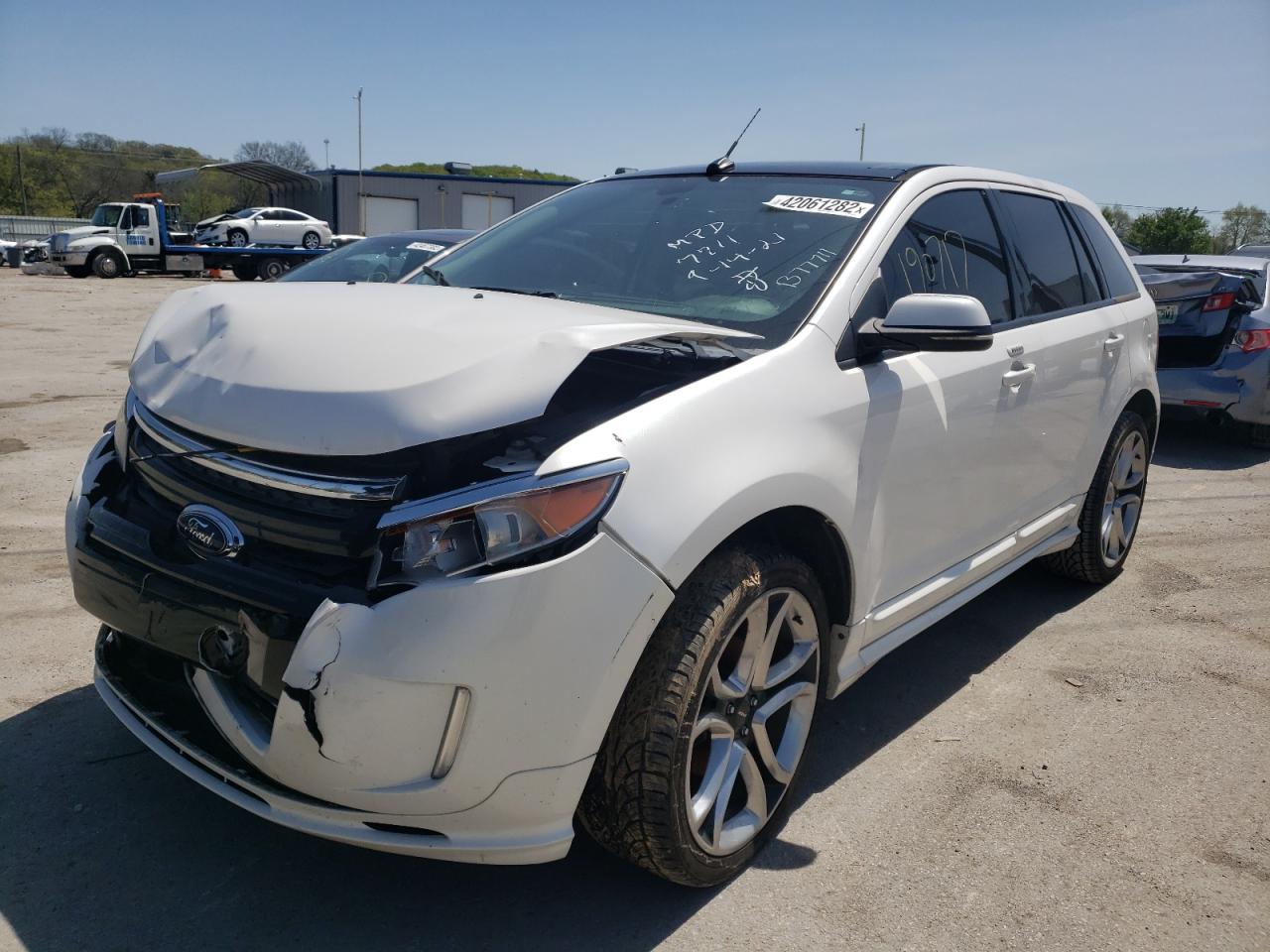 Photo 2 from auction – 2013 FORD EDGE SPORT with VIN 2FMDK3AK9DBB77711