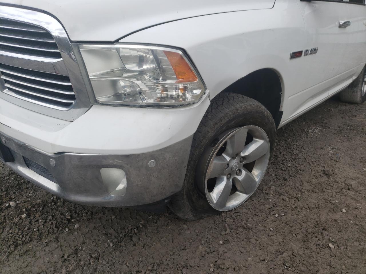Photo 9 from auction – 2014 RAM 1500 SLT with VIN 1C6RR7LM1ES317468
