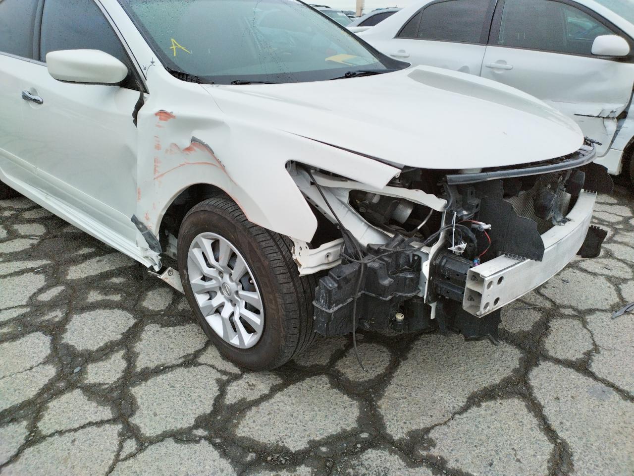 Photo 9 from auction – 2014 NISSAN ALTIMA 2.5 with VIN 1N4AL3AP6EN216296
