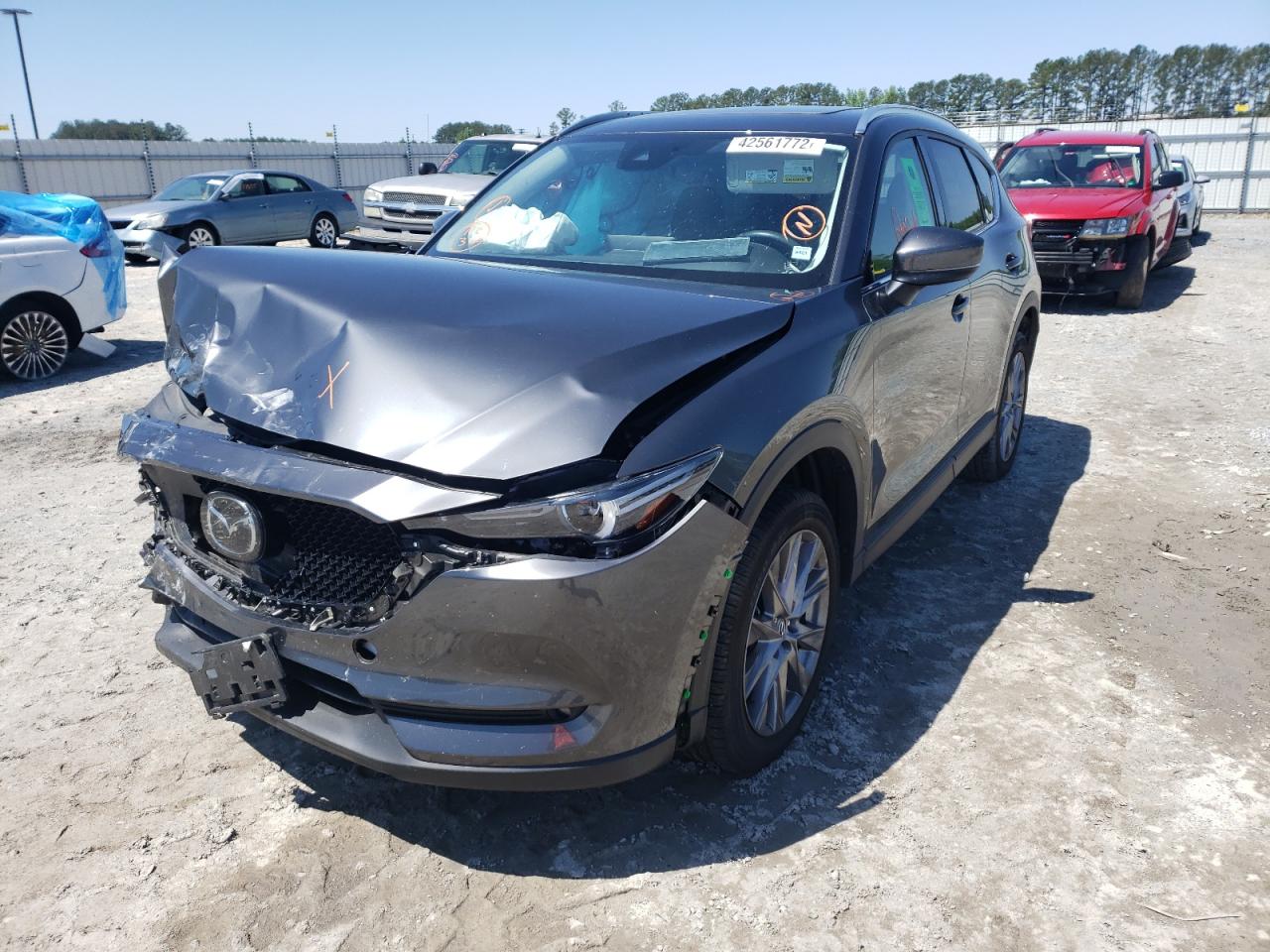 Photo 2 from auction – 2021 MAZDA CX-5 GRAND with VIN JM3KFBAY5M0366749