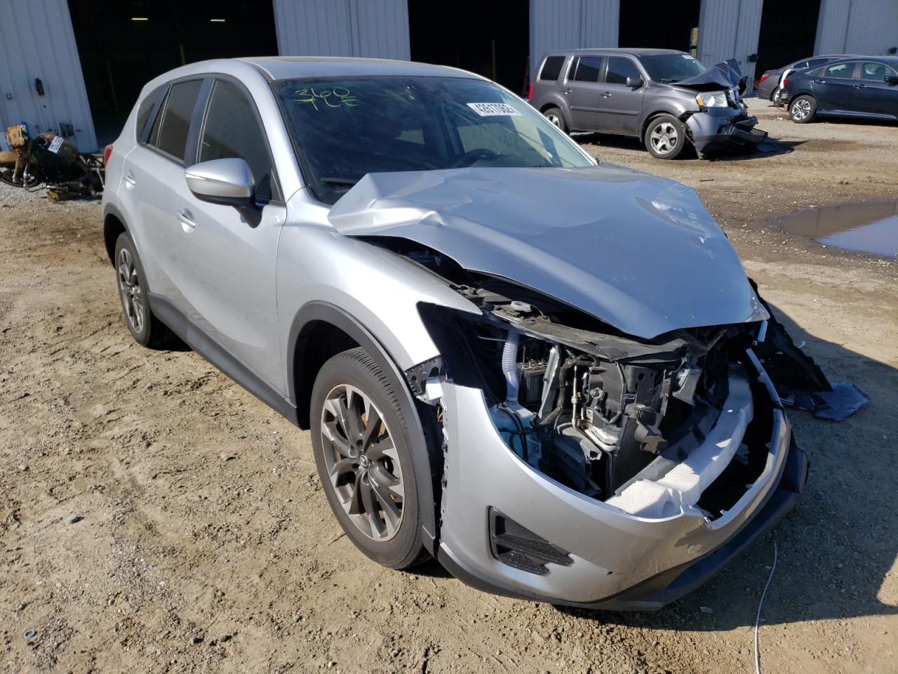 MAZDA CX-5 GT 2016 with VIN JM3KE2DYXG0645214 - Photo from auction