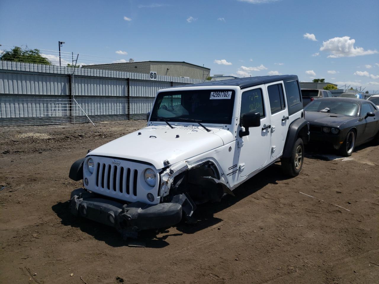 Photo 2 from auction – 2016 JEEP WRANGLER U with VIN 1C4BJWDG0GL280625