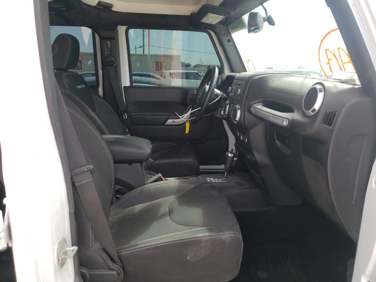 Photo 5 from auction – 2016 JEEP WRANGLER U with VIN 1C4BJWFG3GL104892