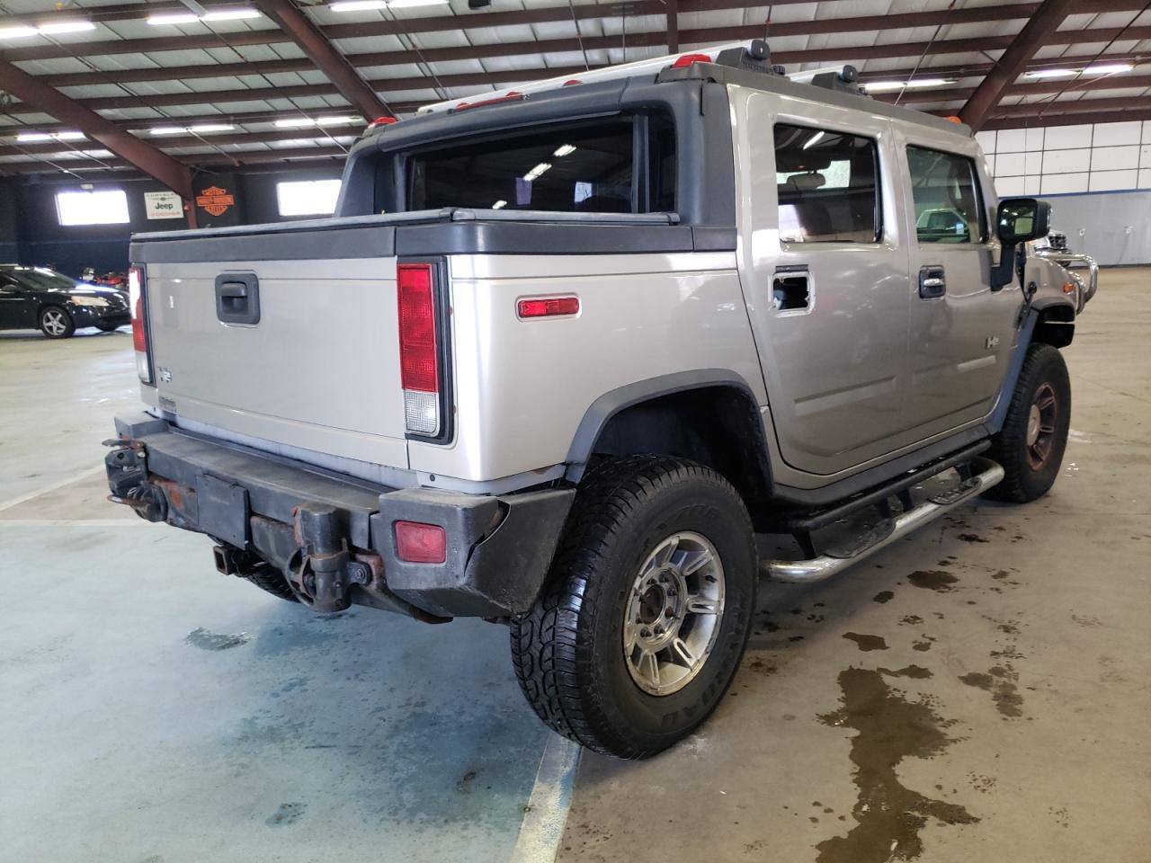 Photo 4 from auction – 2006 HUMMER H2 SUT with VIN 5GRGN22U46H111347
