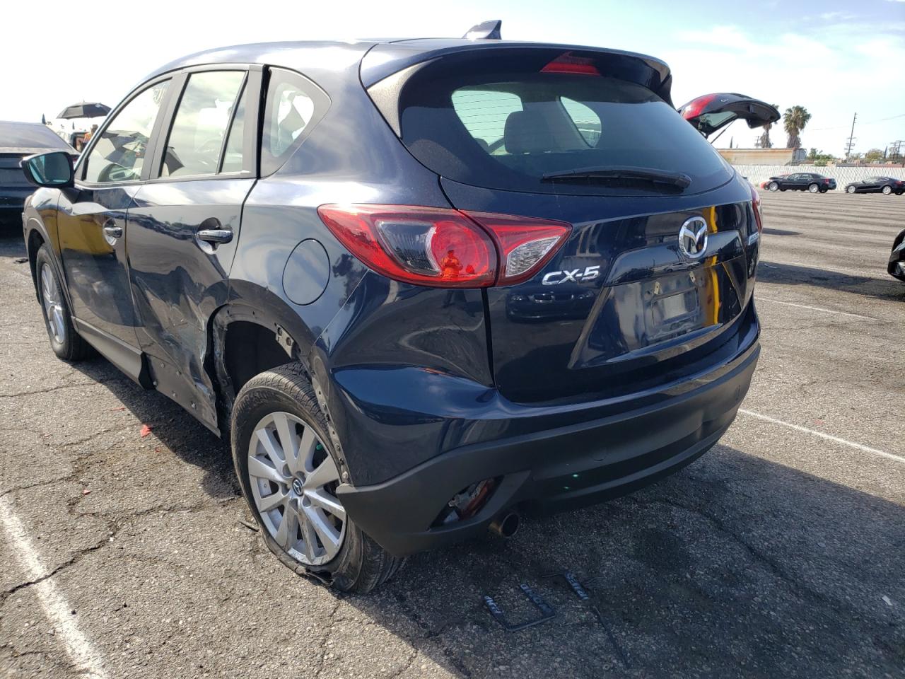 Photo 3 from auction – 2015 MAZDA CX-5 SPORT with VIN JM3KE2BE3F0527092