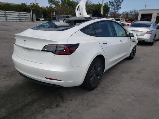 Photo 4 from auction – 2021 TESLA MODEL 3 with VIN 5YJ3E1EA2MF090345