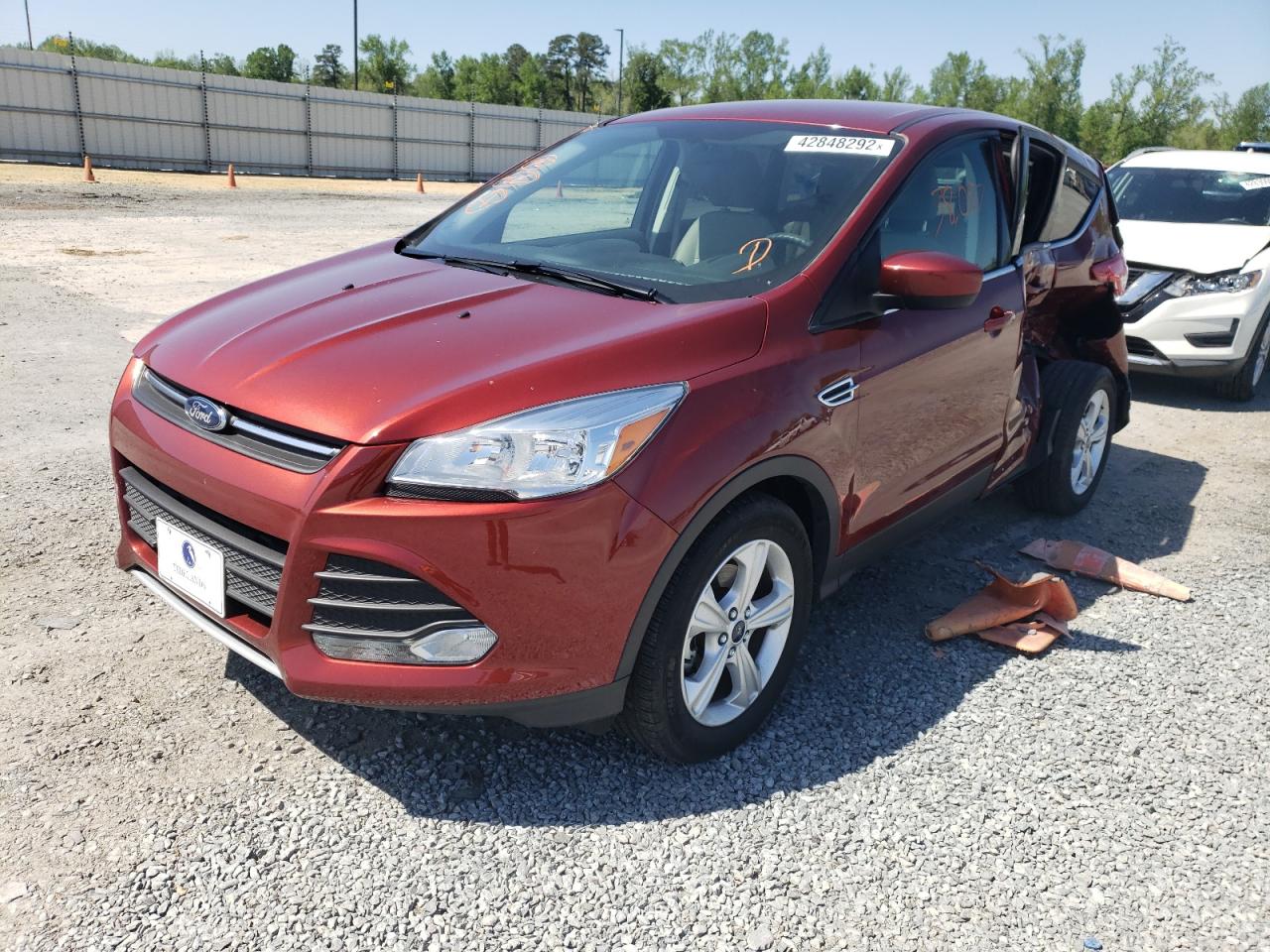 Photo 2 from auction – 2016 FORD ESCAPE SE with VIN 1FMCU0G73GUB51997