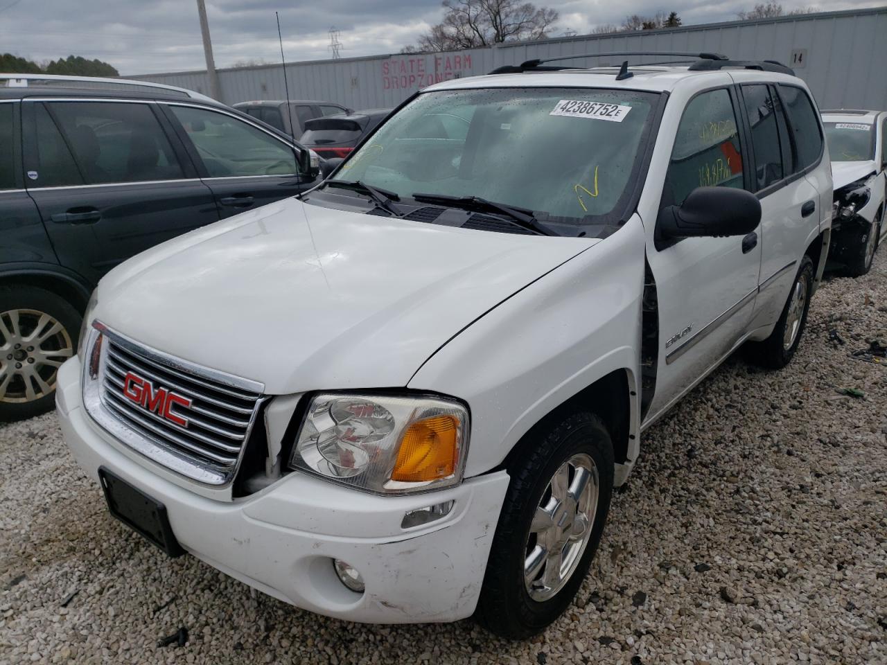 Photo 2 from auction – 2006 GMC ENVOY with VIN 1GKDT13S662187631