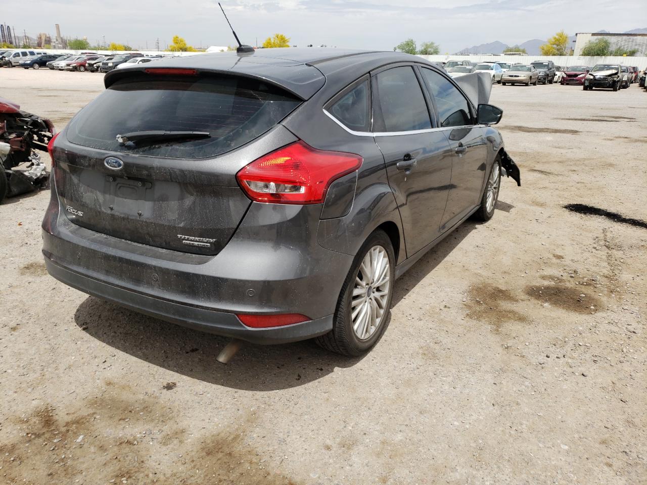 Photo 4 from auction – 2015 FORD FOCUS TITA with VIN 1FADP3N21FL287936