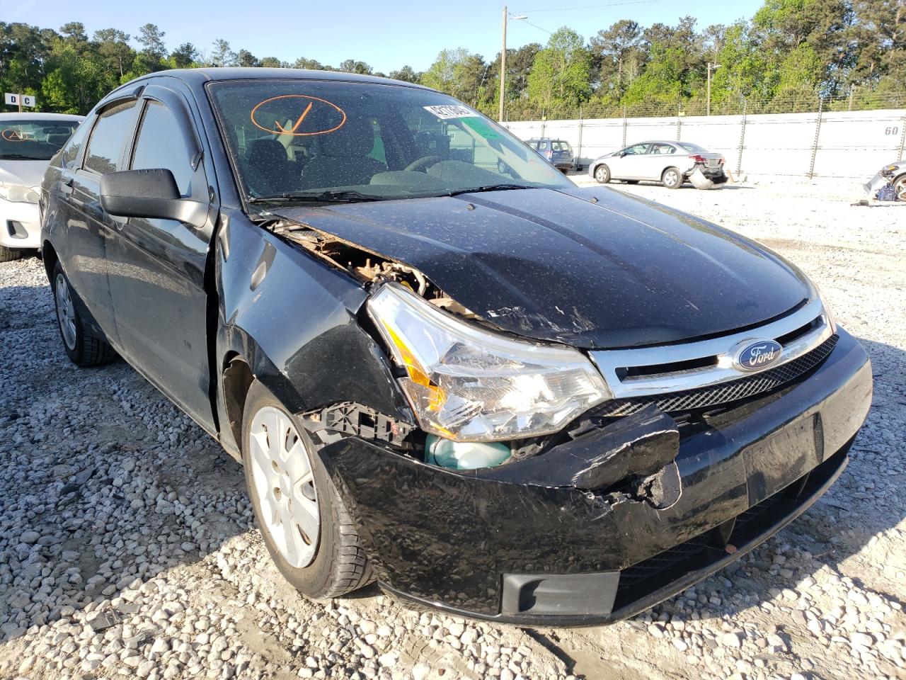 FORD FOCUS S 2011 with VIN 1FAHP3EN1BW124093 - Photo from auction