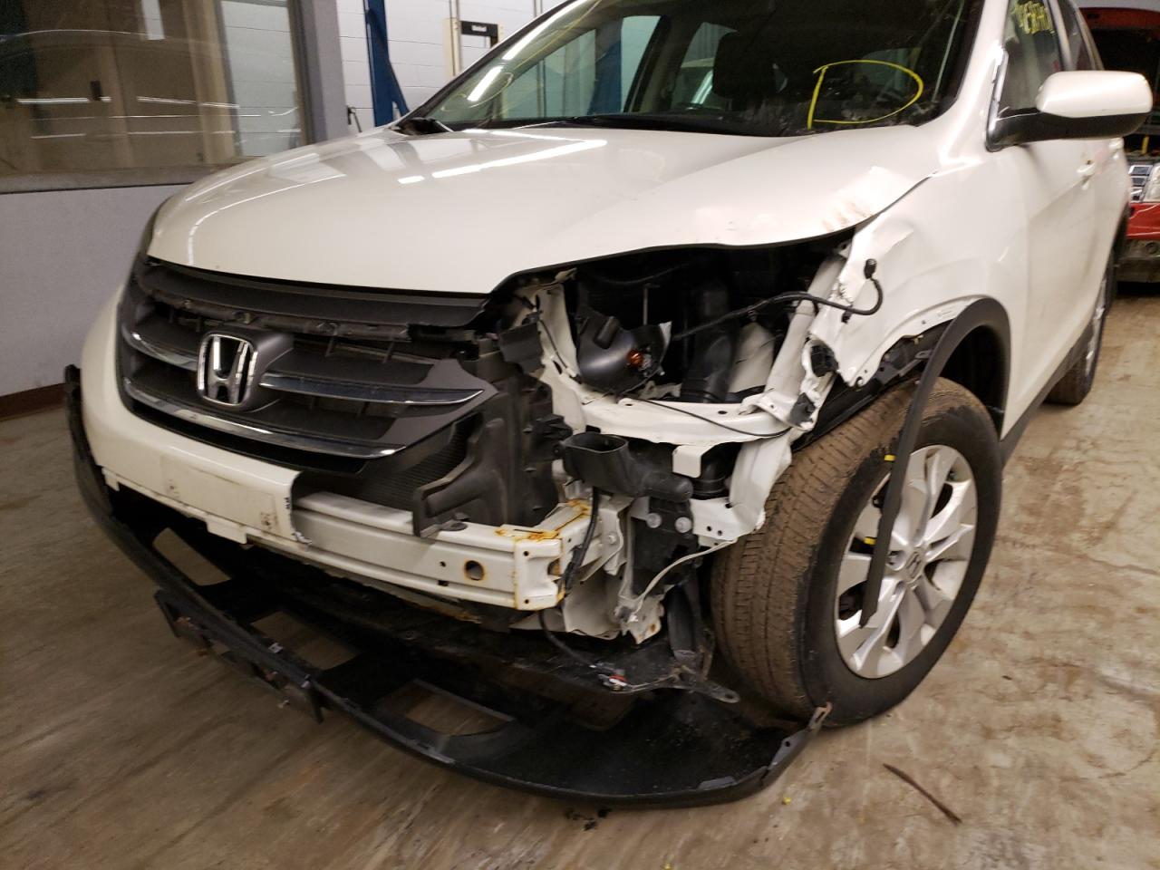 Photo 9 from auction – 2014 HONDA CR-V EXL with VIN 5J6RM4H75EL083882