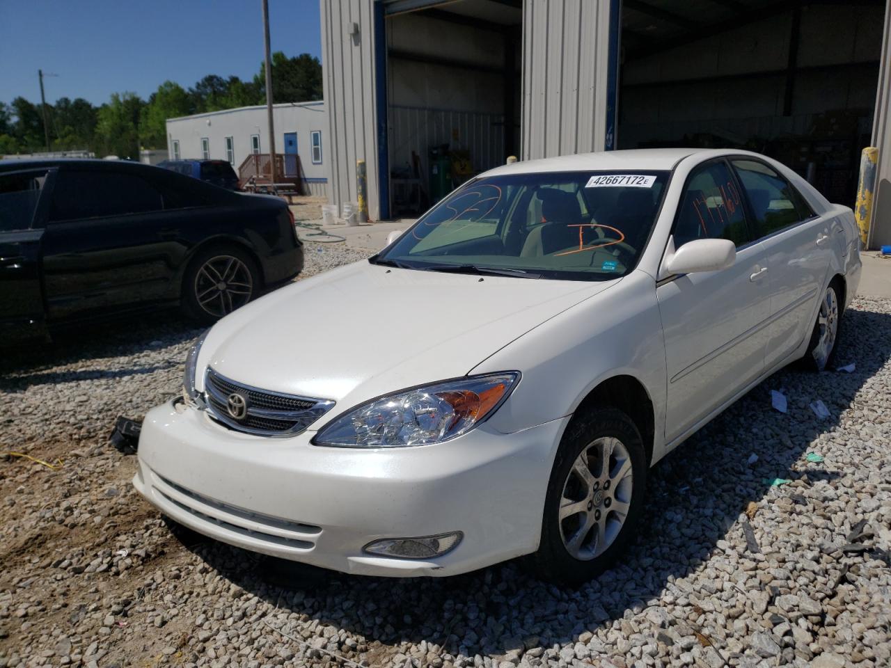 Photo 2 from auction – 2004 TOYOTA CAMRY LE with VIN JTDBE32K940285863