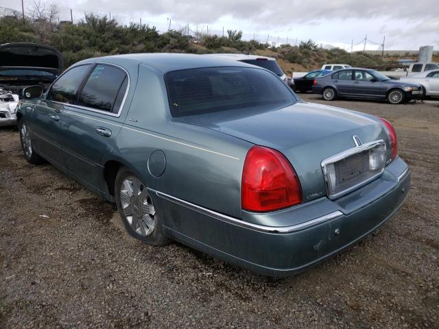 Photo 3 from auction – 2004 LINCOLN TOWN CAR U with VIN 1LNHM83W84Y665897