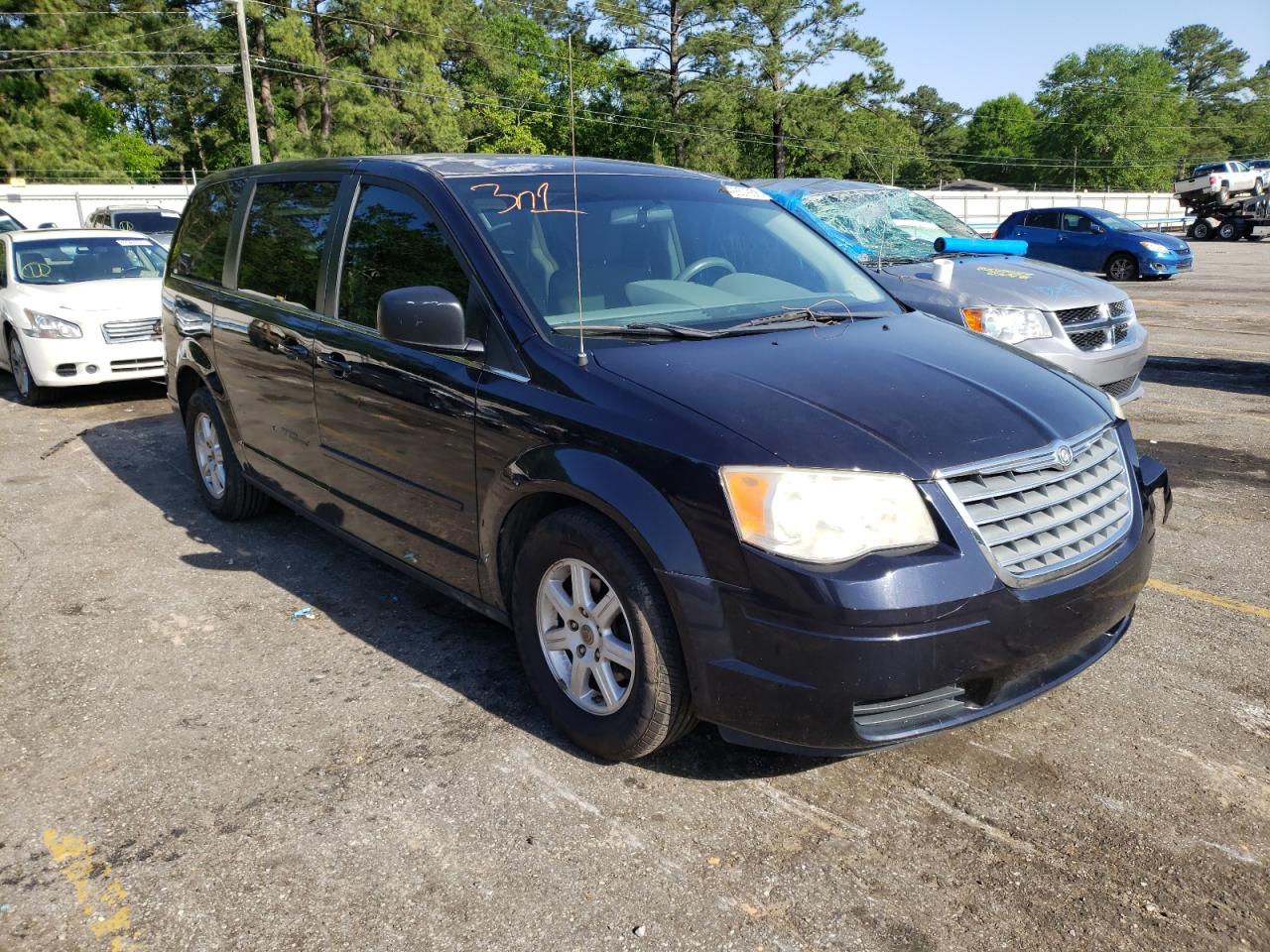 CHRYSLER TOWN & COU 2010 with VIN 2A4RR2D10AR415333 - Photo from auction
