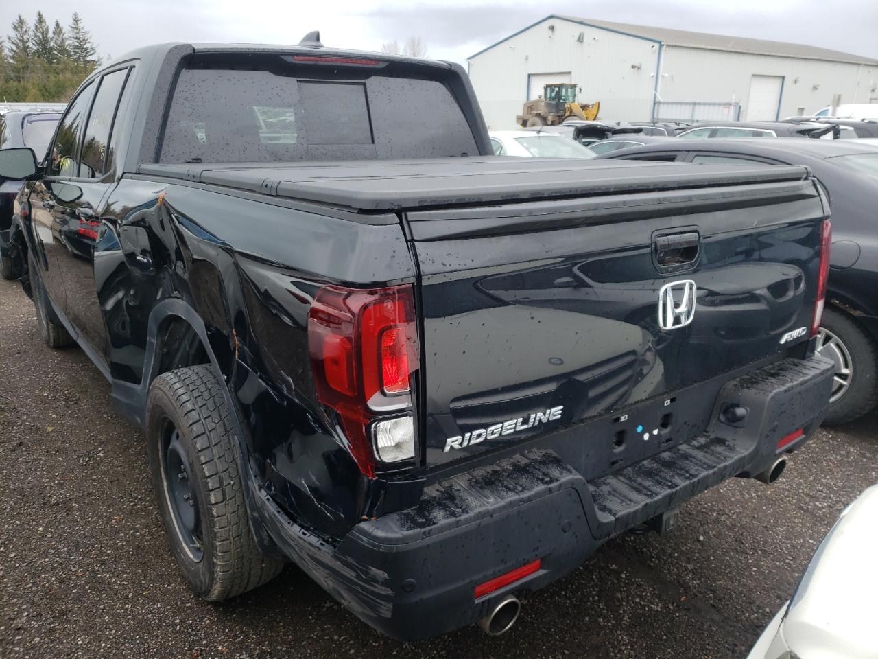 Photo 3 from auction – 2022 HONDA RIDGELINE with VIN 5FPYK3F89NB501044