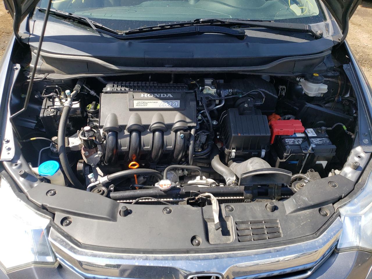 Photo 7 from auction – 2012 HONDA INSIGHT LX with VIN JHMZE2H54CS003592
