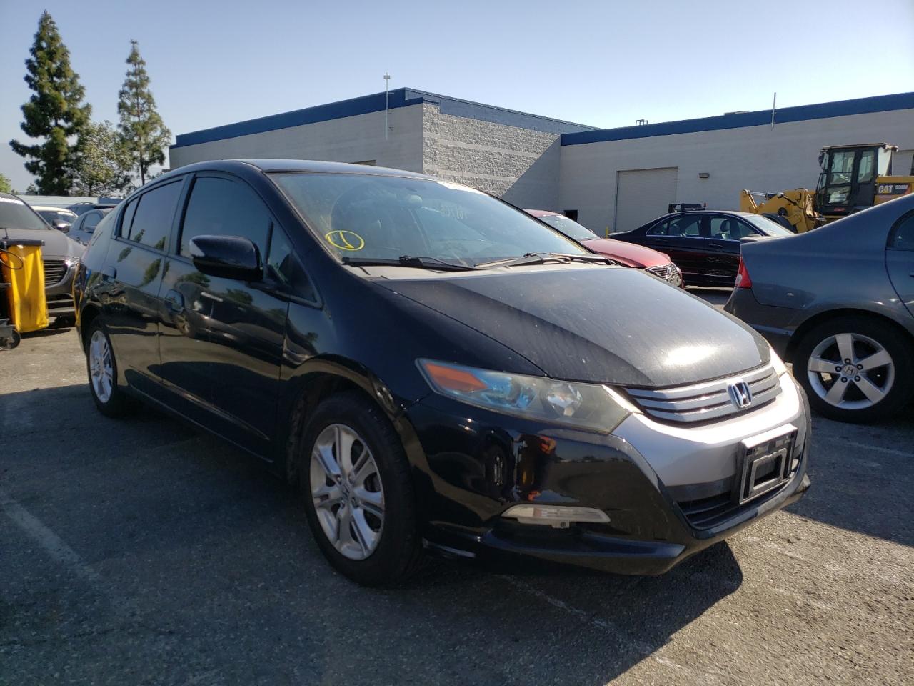 HONDA INSIGHT EX 2010 with VIN JHMZE2H78AS006932 - Photo from auction