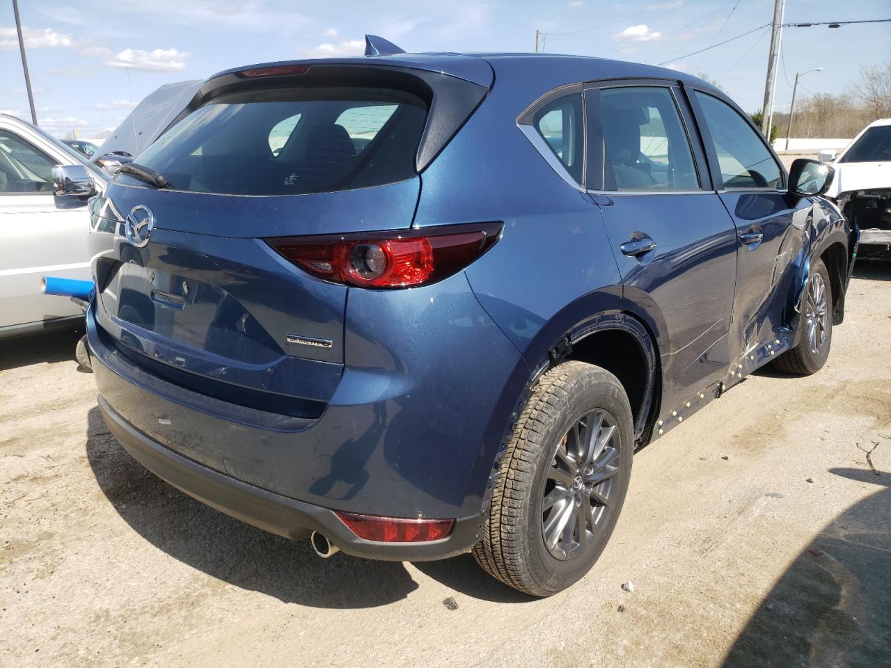 Photo 4 from auction – 2021 MAZDA CX-5 SPORT with VIN JM3KFABM3M0304773