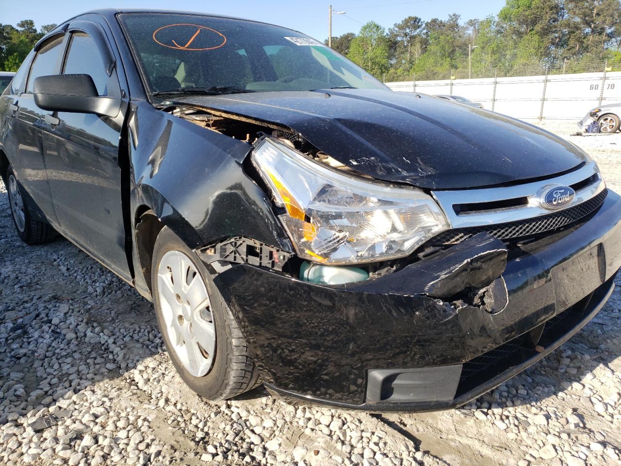 Photo 9 from auction – 2011 FORD FOCUS S with VIN 1FAHP3EN1BW124093
