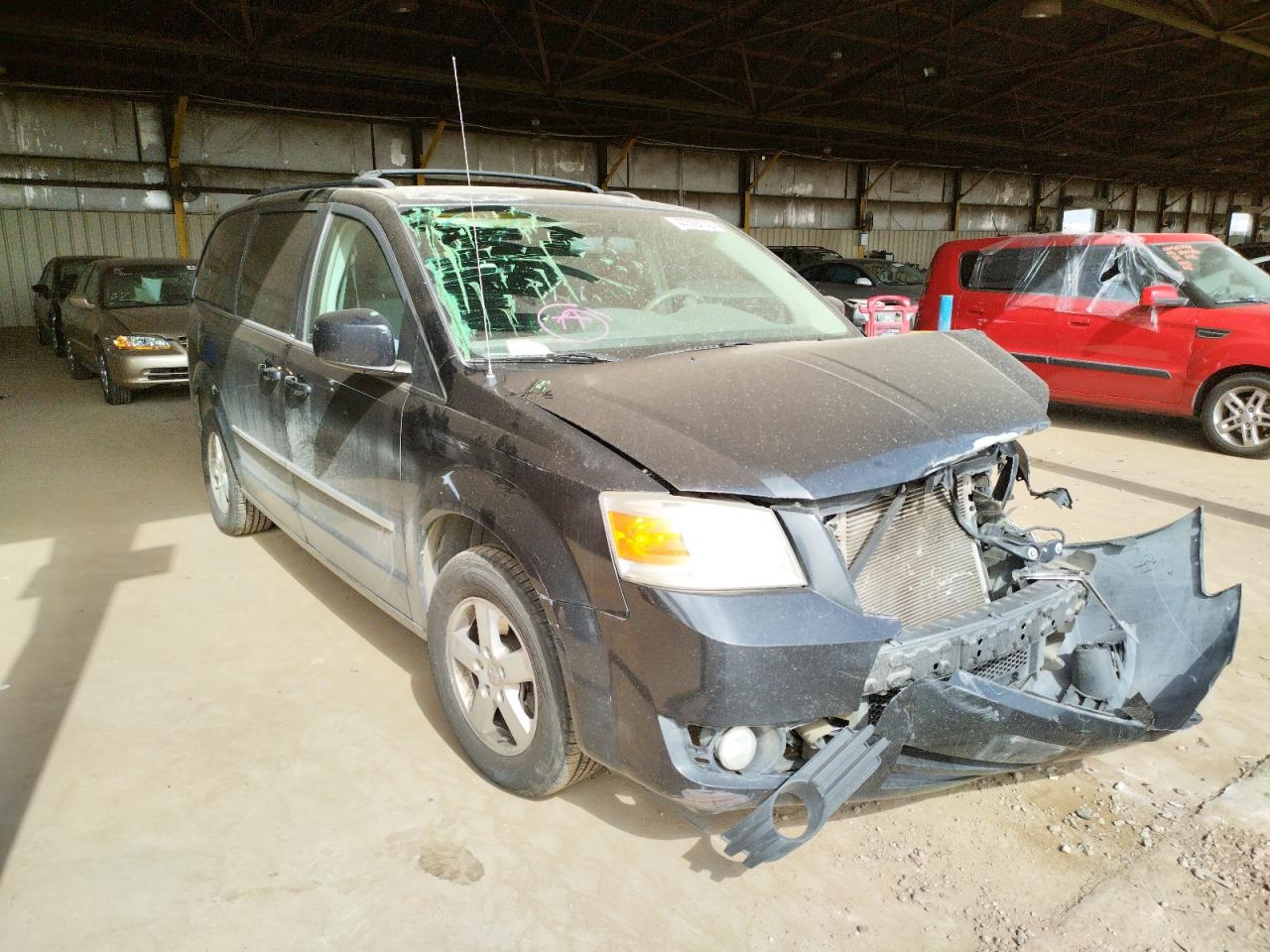 DODGE GRAND CARA 2010 with VIN 2D4RN5D19AR459157 - Photo from auction