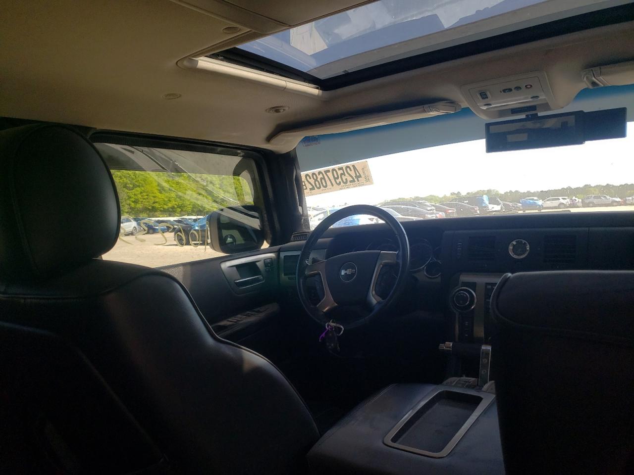 Photo 9 from auction – 2008 HUMMER H2 with VIN 5GRGN23828H105695