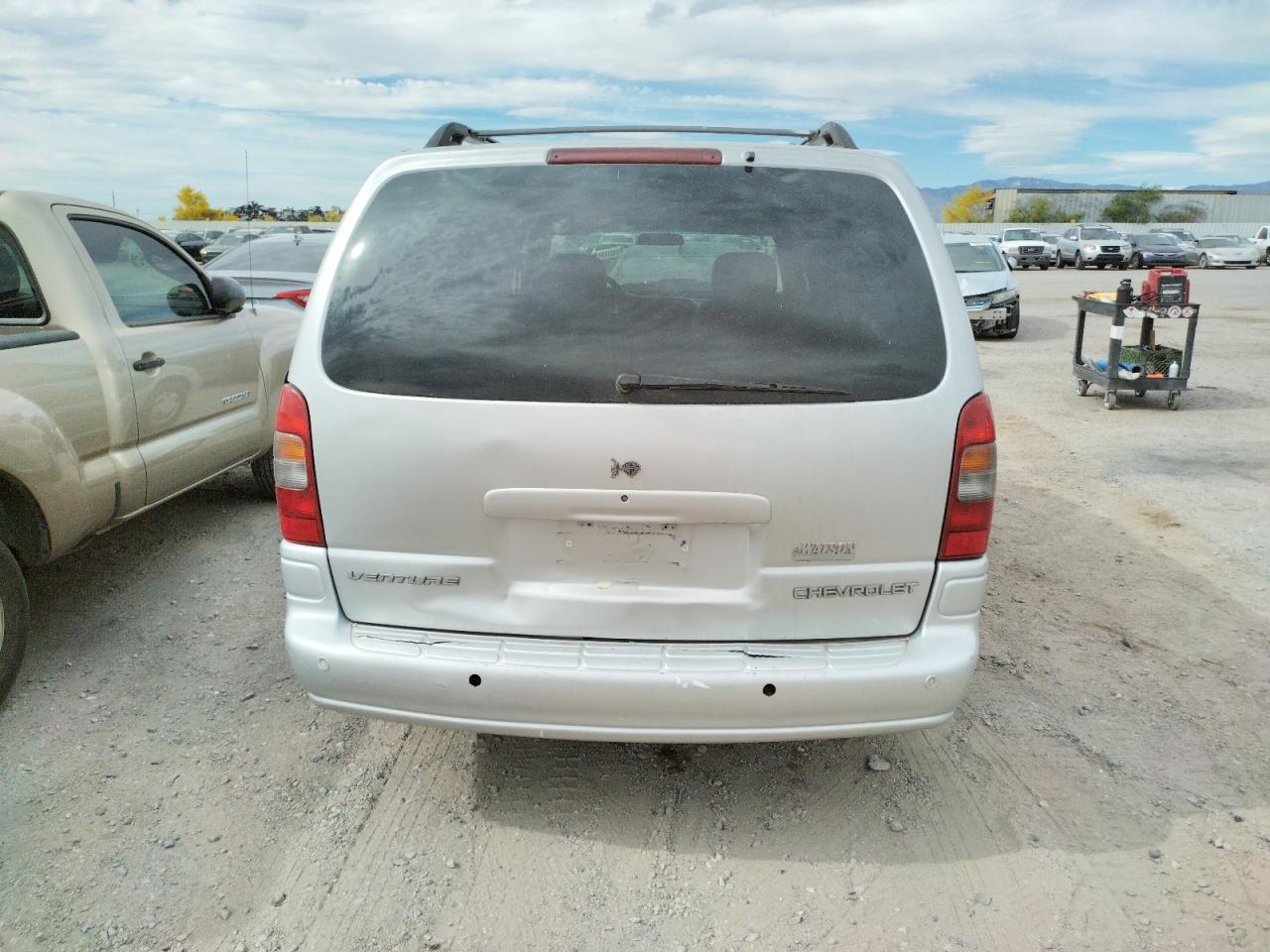 Photo 9 from auction – 2002 CHEVROLET VENTURE LU with VIN 1GNDX13E22D141391