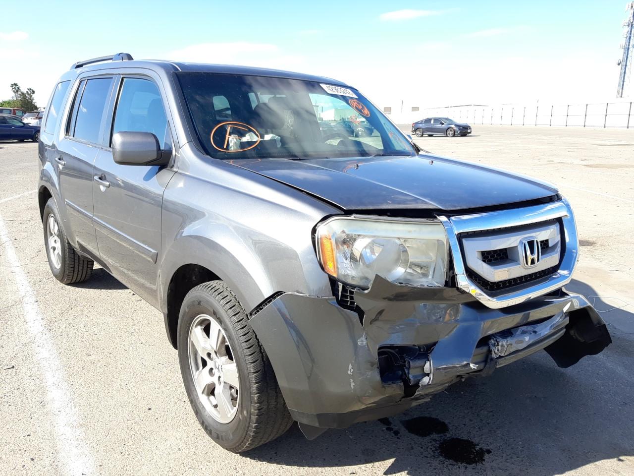 HONDA PILOT EXL 2011 with VIN 5FNYF3H67BB009388 - Photo from auction