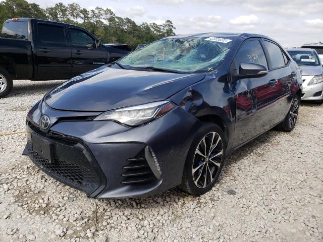 Photo 2 from auction – 2018 TOYOTA COROLLA L with VIN 5YFBURHE9JP772912