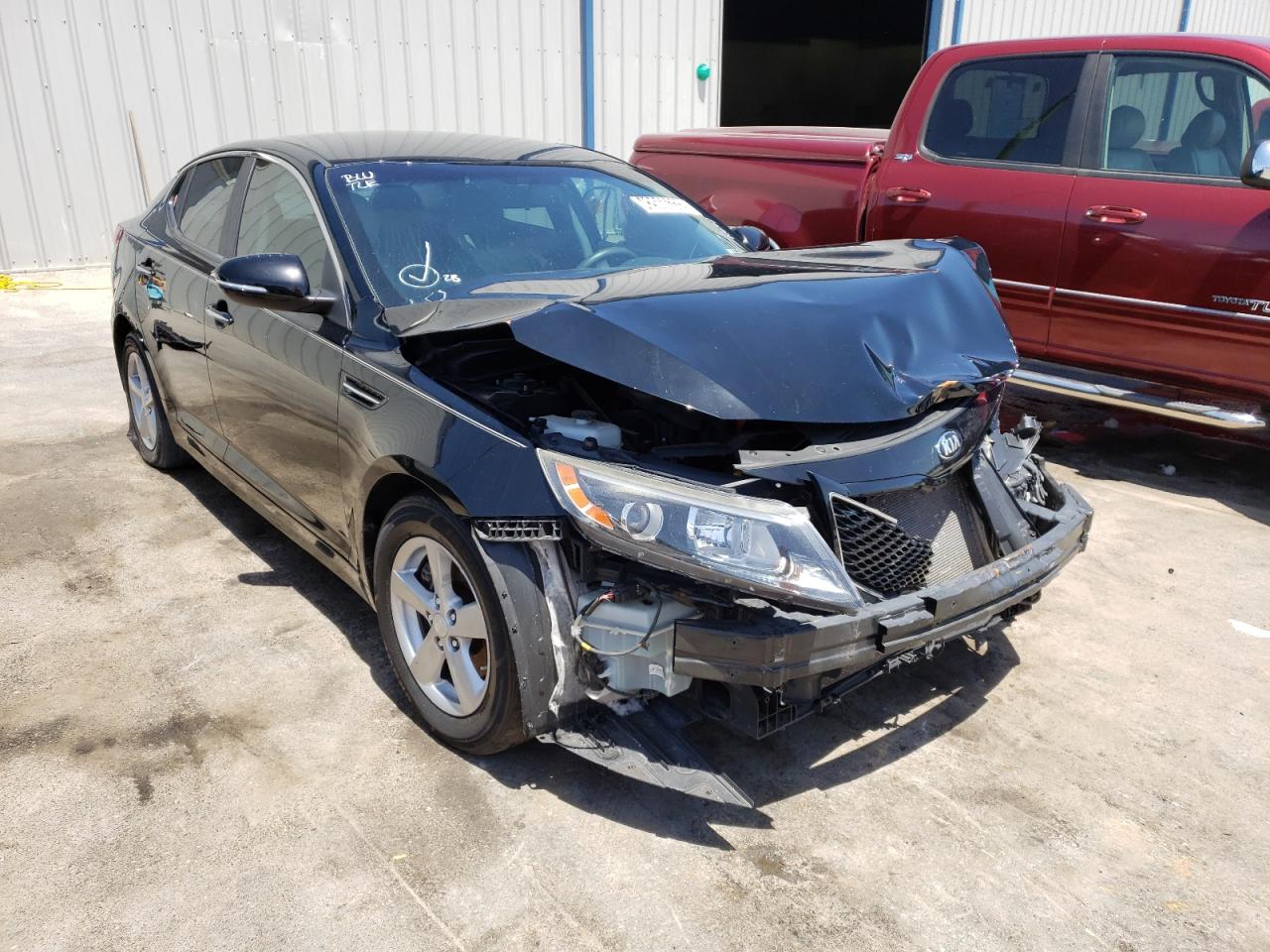 KIA OPTIMA LX 2014 with VIN 5XXGM4A70EG323167 - Photo from auction