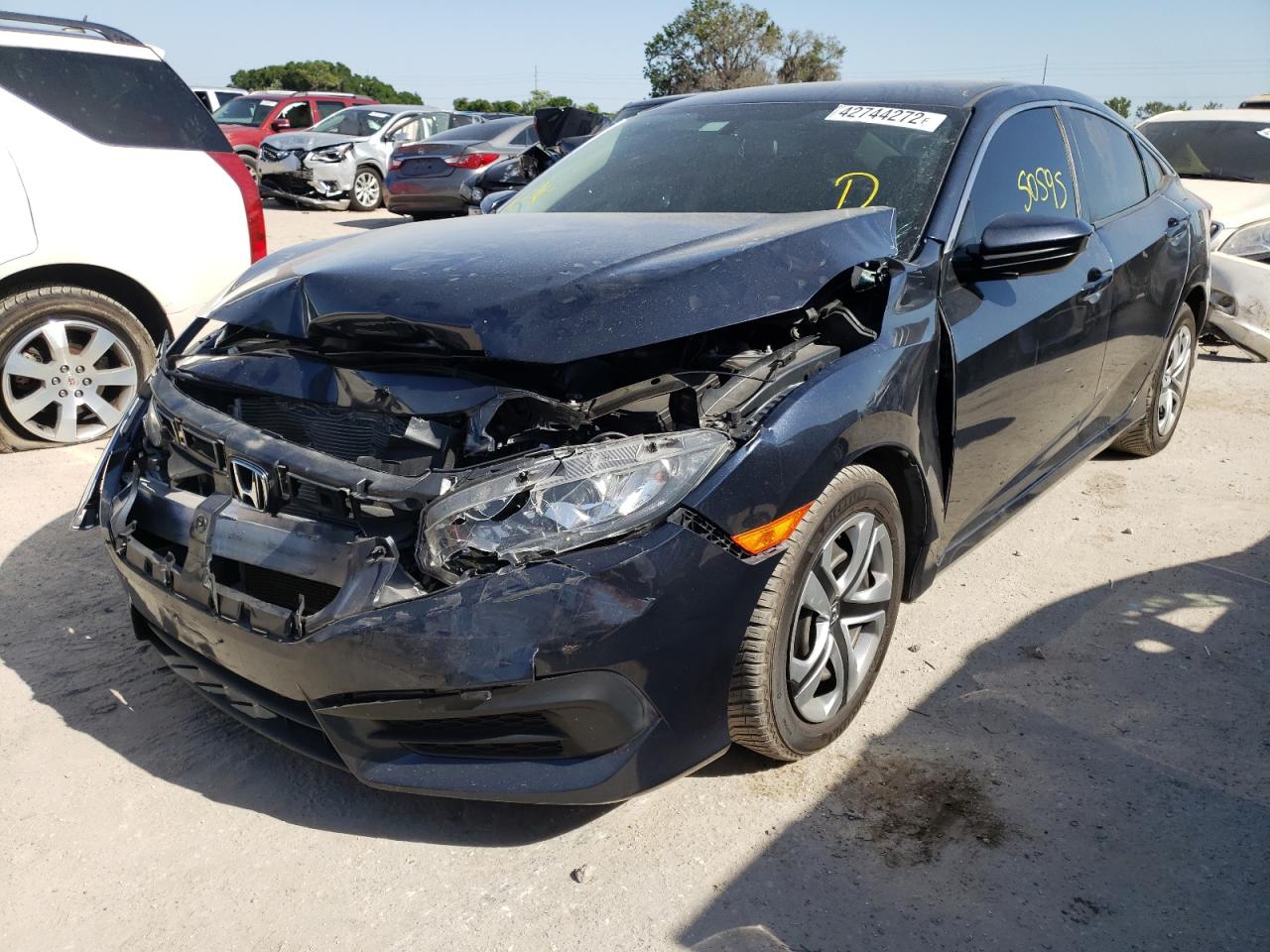 Photo 2 from auction – 2017 HONDA CIVIC LX with VIN 19XFC2F58HE078593