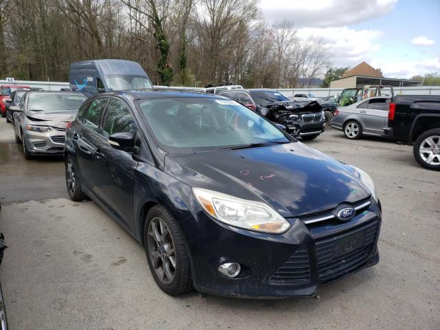 FORD FOCUS SE 2014 with VIN 1FADP3K23EL188814 - Photo from auction