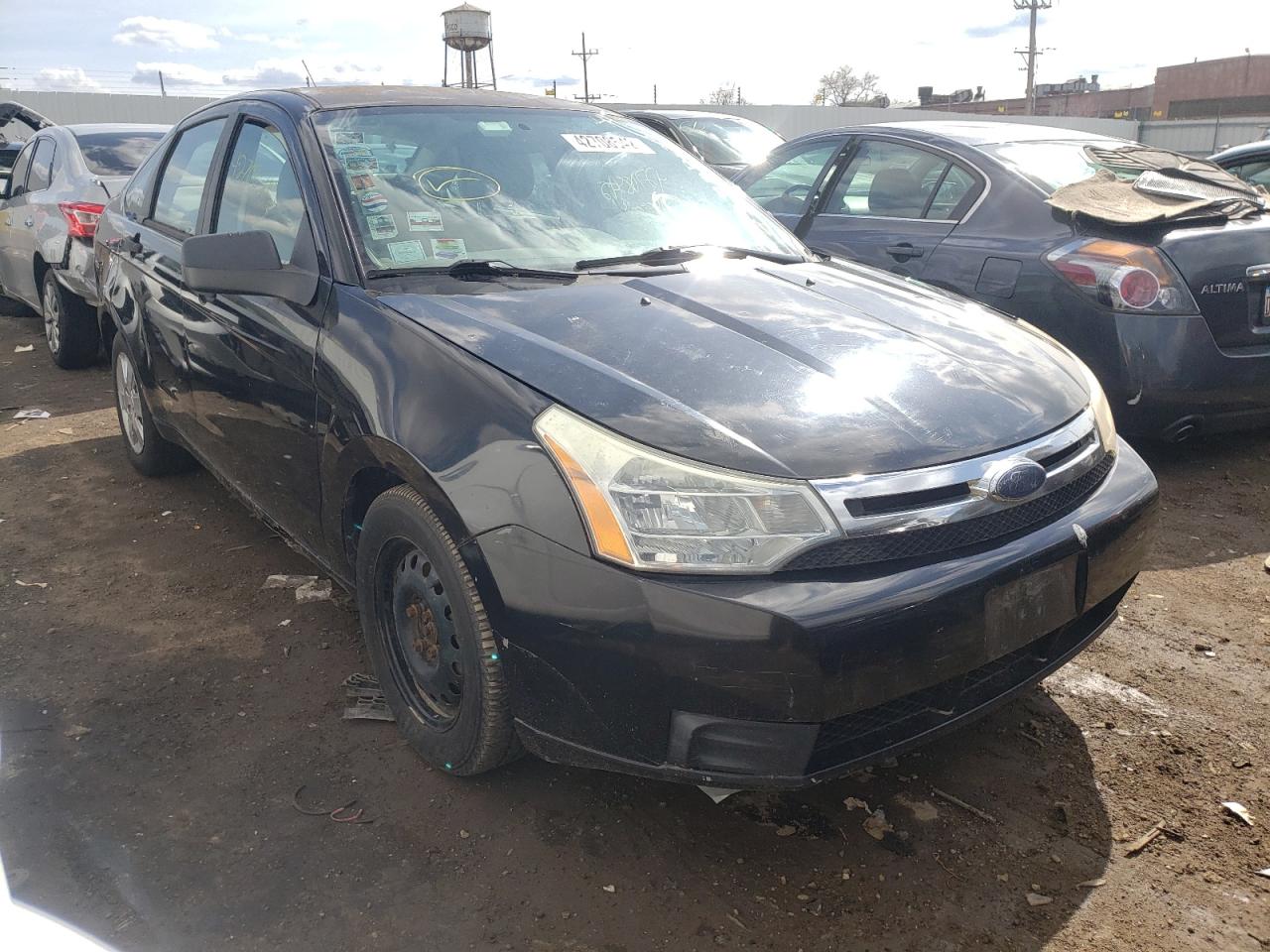 FORD FOCUS S 2009 with VIN 1FAHP34N59W233880 - Photo from auction