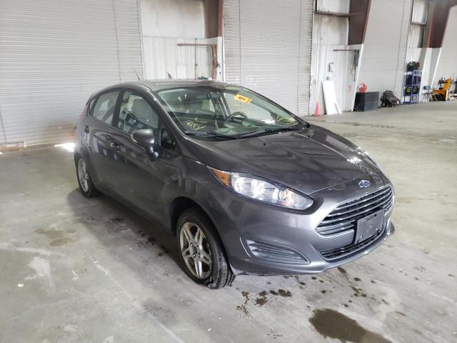 FORD FIESTA SE 2018 with VIN 3FADP4EJ1JM144571 - Photo from auction