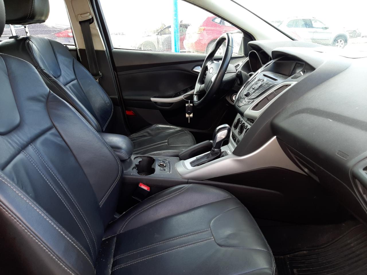 Foto 5 de la subasta – 2014 FORD FOCUS SE con VIN 1FADP3K23EL419016