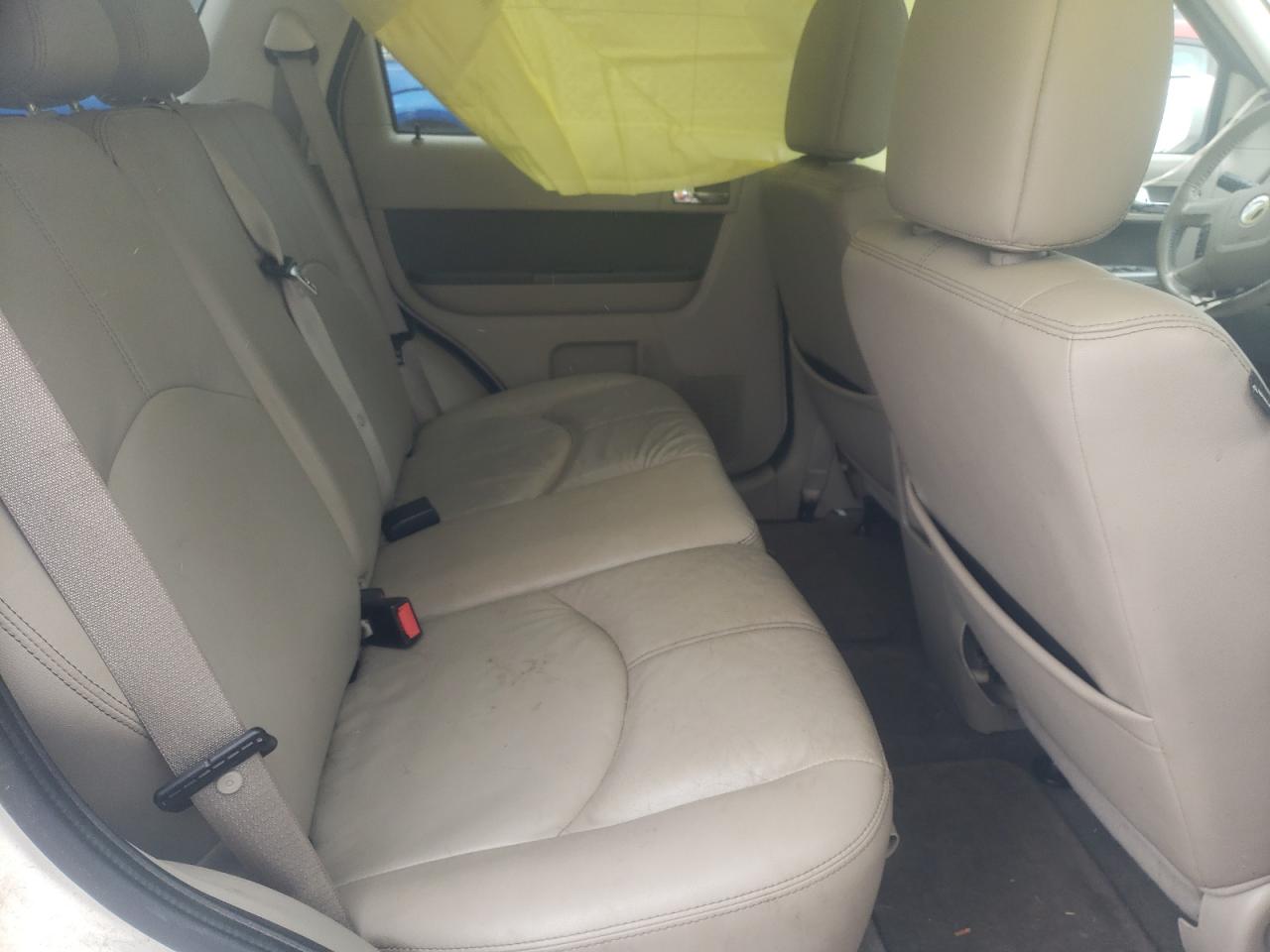 Photo 6 from auction – 2009 MERCURY MARINER PR with VIN 4M2CU87719KJ13695