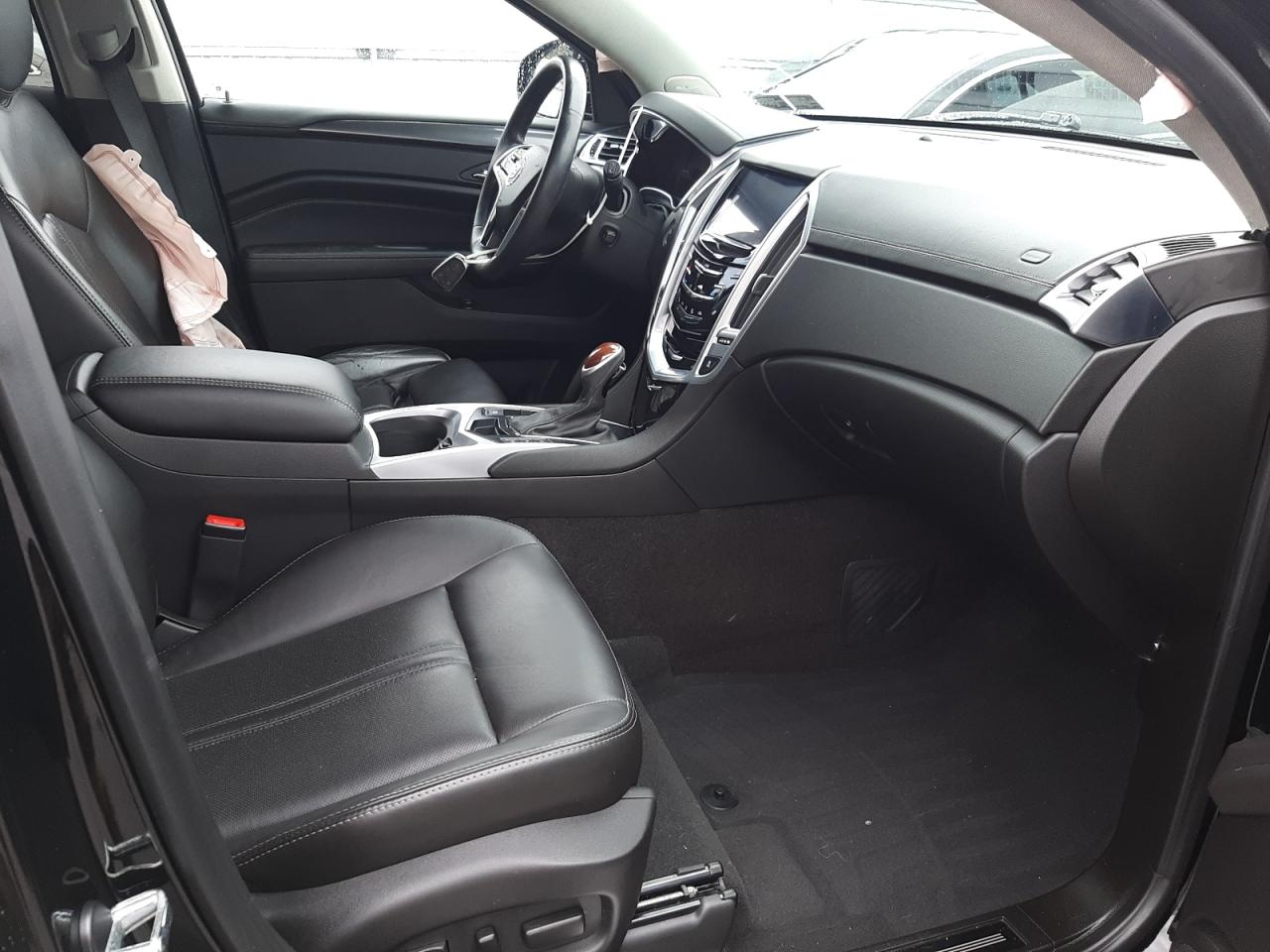 Photo 5 from auction – 2016 CADILLAC SRX PERFOR with VIN 3GYFNCE38GS567487