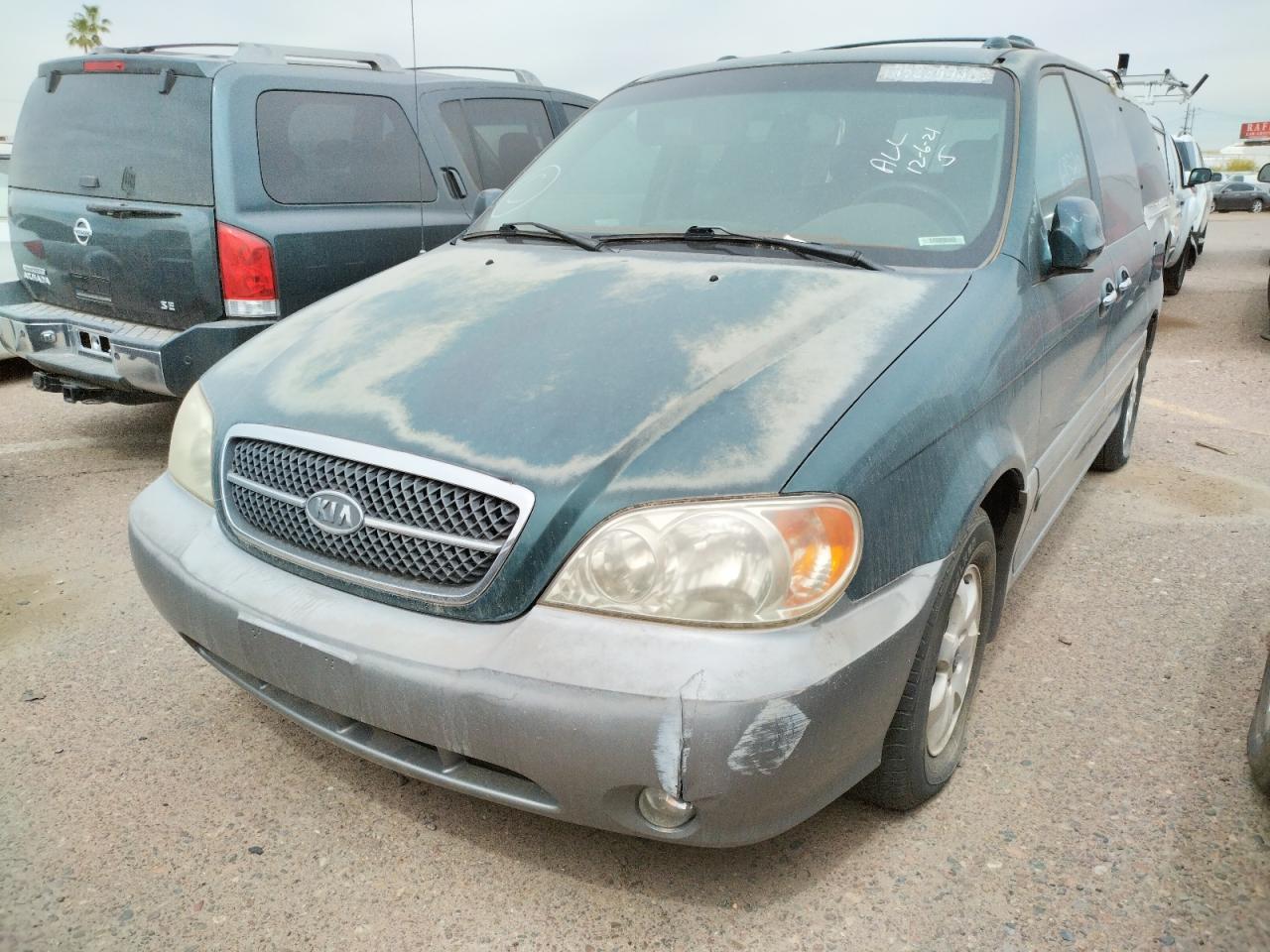Photo 2 from auction – 2004 KIA SEDONA EX with VIN KNDUP131546595390