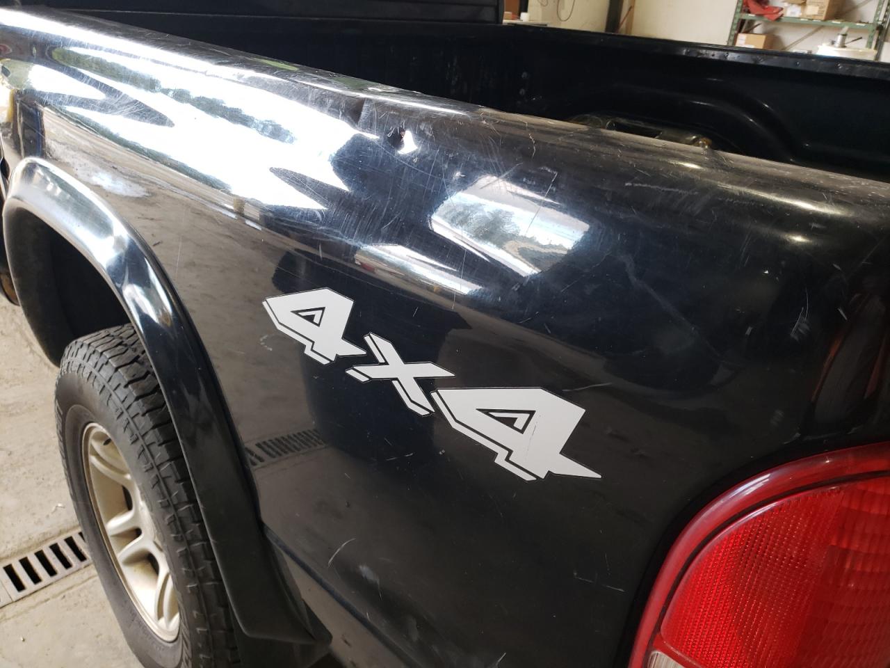 Photo 9 from auction – 2003 DODGE DAKOTA QUA with VIN 1D7HG38X83S382164