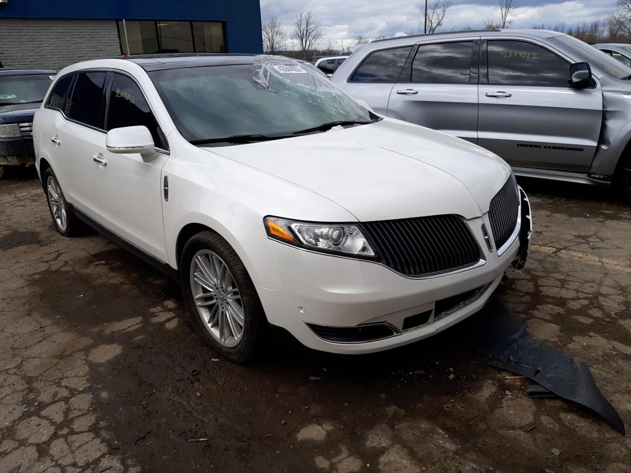 LINCOLN MKT 2014 with VIN 2LMHJ5AT8EBL57566 - Photo from auction