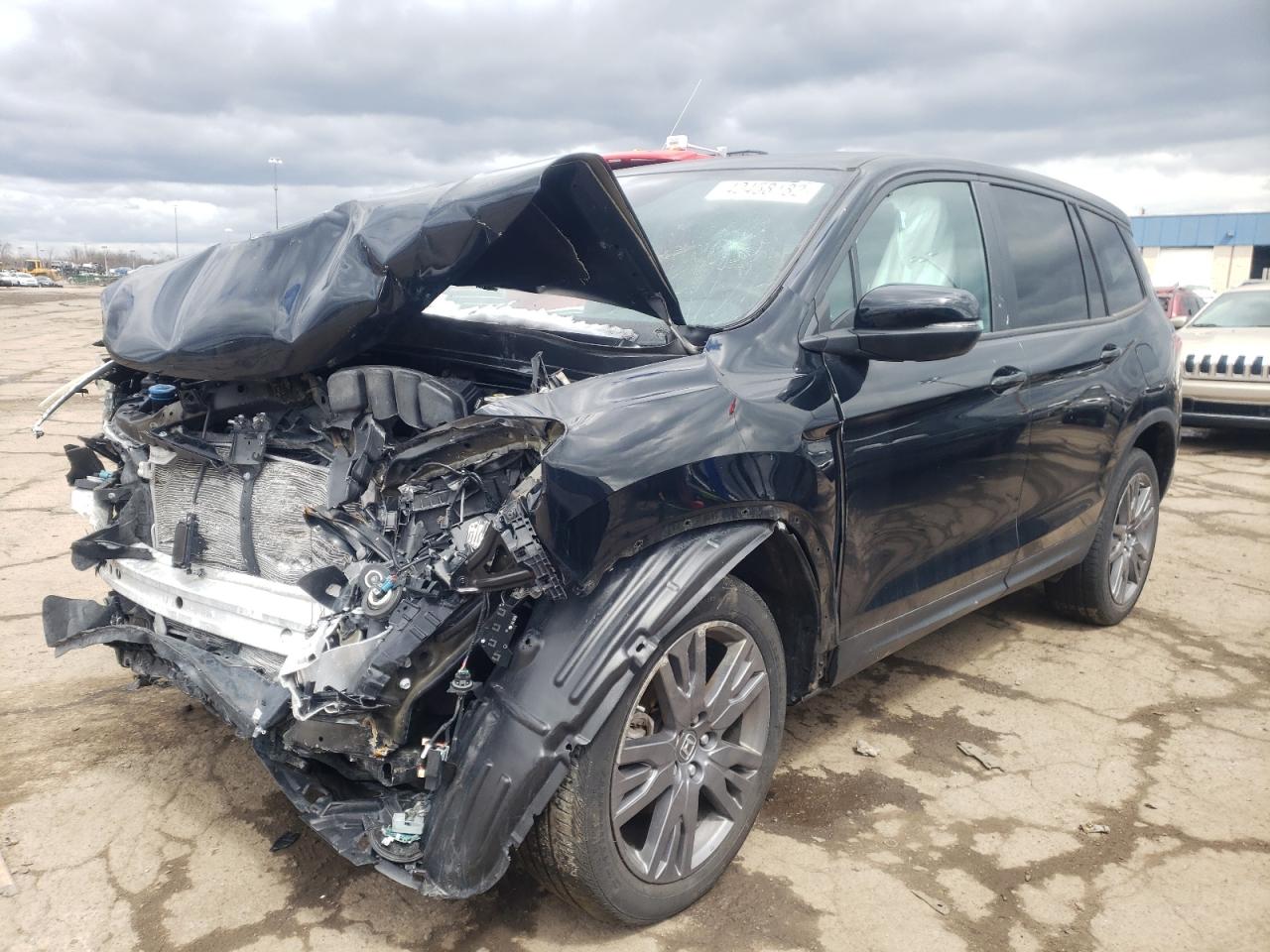 Photo 2 from auction – 2019 HONDA PASSPORT E with VIN 5FNYF8H59KB024124